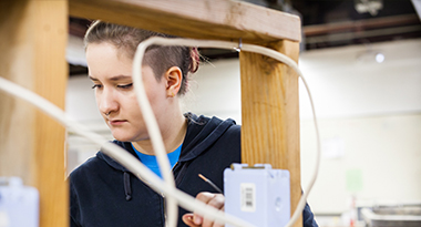 Student of TERO Vocational Training Center working on an electrical project.