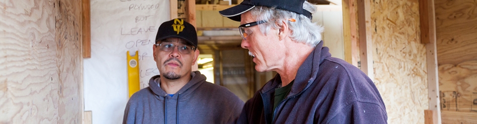 TVTC student and instructor working together on a carpentry project.