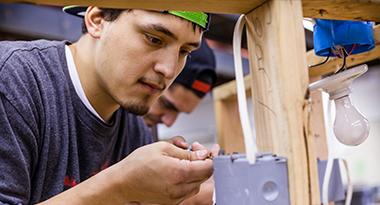 Students of TERO Vocational Training Center working on an electrical project.